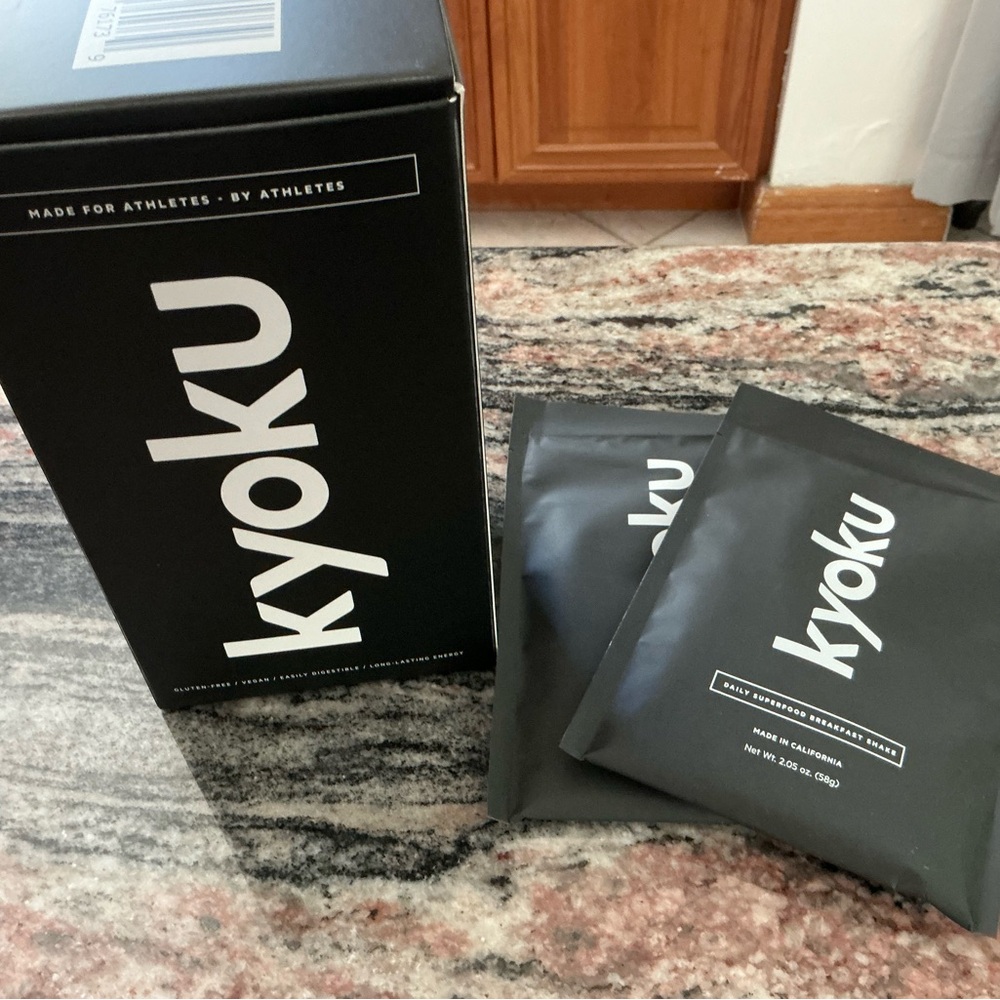 Kyoku Superfood Breakfast Powder with USB rechargeable portable blender.